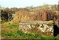 Milk churn stand near Mountover Farm