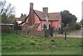 House by Finningham churchyard