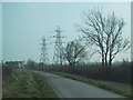 Powerlines cross the road near Berkeley Power station