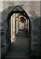 SU4829 : Path under buttresses, Winchester Cathedral by Espresso Addict