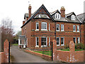 Substantial red-brick semi