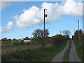 View west along the farm road past Siop-y-goeden farm