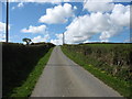 The Llanfechell road climbing the slope of a drumlin above the Wygyr valley