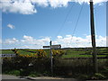 Road sign at the junction of Mountain Road and the Llygeirian Road