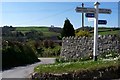 A road junction where the road to Bugford, East Down & Clifton commences.