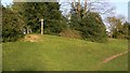 Field with footpath signpost