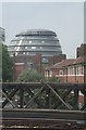 City Hall from aboard a train on the approach to London Bridge Railway Station SE1