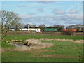 SJ9322 : River Penk and West Coast Main Line at Baswich. by Tim Marshall