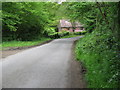 Looking north towards house that occupies the triangular piece of land where three roads meet