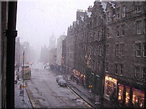 NT2573 : The Royal Mile at a snowy Hogmanay by Kenneth Yarham