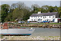 The Ship Inn at Red Wharf  Bay, with a sad looking Yacht Sunrise in the foreground