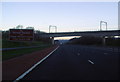 NY5326 : Railway bridge over the M6 motorway by Ann Cook