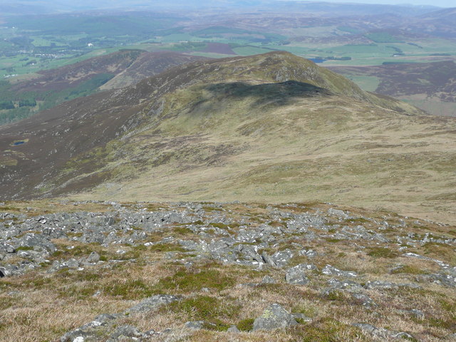 Rocky top of Ben Vrackie and Meall an Daimh beyond