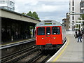 Underground Train Arrives at East Putney