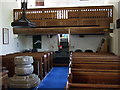 Gallery and font at Pennard church