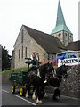 Horses and wagon approaching the Harting Festivities.