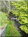 Clunskea Burn about to flow under the A924