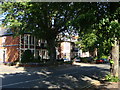 Houses and the junction of Glencairn Park Road with Queens Road