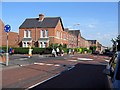 Mini-roundabout: Alexandra and Whitehall Roads