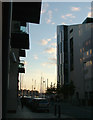 Sunset seen down narrow side street, Ipswich docks