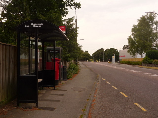 West Parley: postbox № BH22 157 and phone, New Road