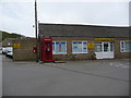 SY4789 : Burton Bradstock: postbox № DT6 112 and phone, Freshwater Holiday Park by Chris Downer