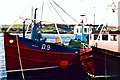 B7923 : Bunbeg - Boats in harbour by Joseph Mischyshyn