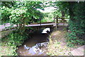 Wooden bridge over the River Bourne, Hamptons Rd