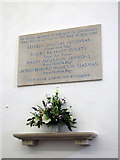 TM3699 : All Saints Church - war memorial on south nave wall by Evelyn Simak
