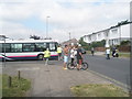 Interested spectators await the carnival at the junction of Credenhill and Ludlow Roads