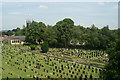 Hazel Grove churchyard, from the railway