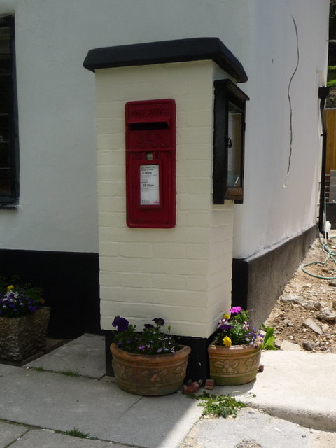 Milton Abbas: postbox and floral display