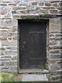 SD7087 : Tower door of St Andrew's, Dent by John S Turner