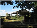 Excavator and Dutch Barn, Waterman Lane