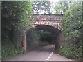 Railway bridge over the road by Washford