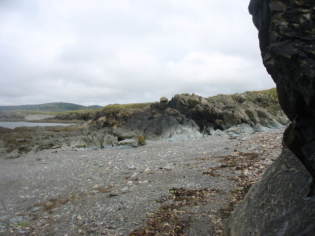 Rocks and shingle beach at Porth y Ffynnon