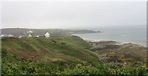 SH2987 : View south towards cottages  above Porth Trwyn by Eric Jones