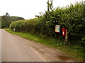 ST8316 : East Orchard: postbox № SP7 34 and noticeboard by Chris Downer