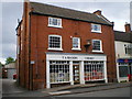 T A Rhodes the chemist in Albrighton