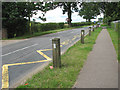 View north-west past the school along Station Road