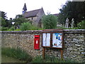 Hethe parish church with postbox