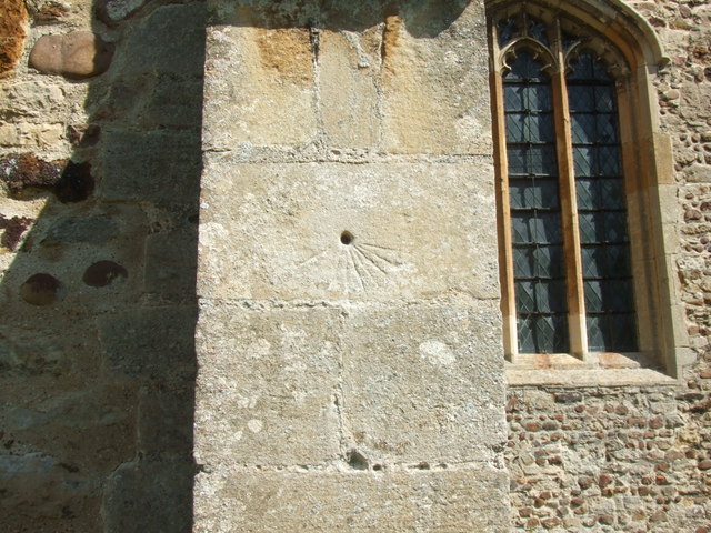 Scratch dial on buttress of Great Paxton church