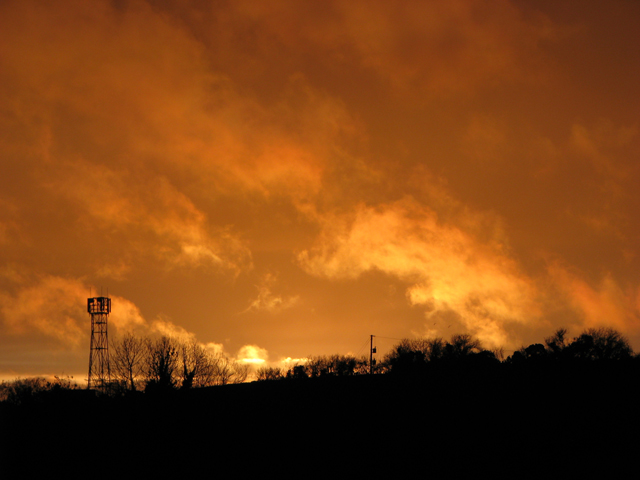 Fiery sunset over 'Orange' tower