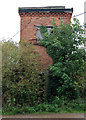 Derelict grain store in Hunningham