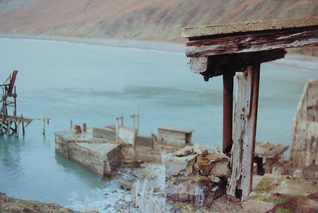 Old loading jetty and derelict quarry building.