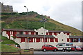 NZ6621 : Beach huts and cliff steps, Saltburn-by-the-Sea by hayley green