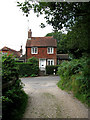TQ3215 : Lodge Hill Cottage by Simon Carey