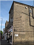 TQ2886 : Old advertising sign, York Rise / Bellgate Mews, NW5 by Mike Quinn