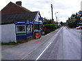TM4361 : Knodishall Village Store, B1069 Snape Rd & Coldfair Green Postbox by Geographer
