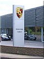 Porsche Centre sign, Woodbridge Meadows, Guildford